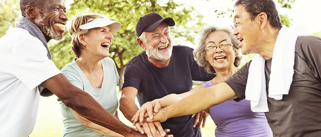 Group of retired principals gathering outdoors