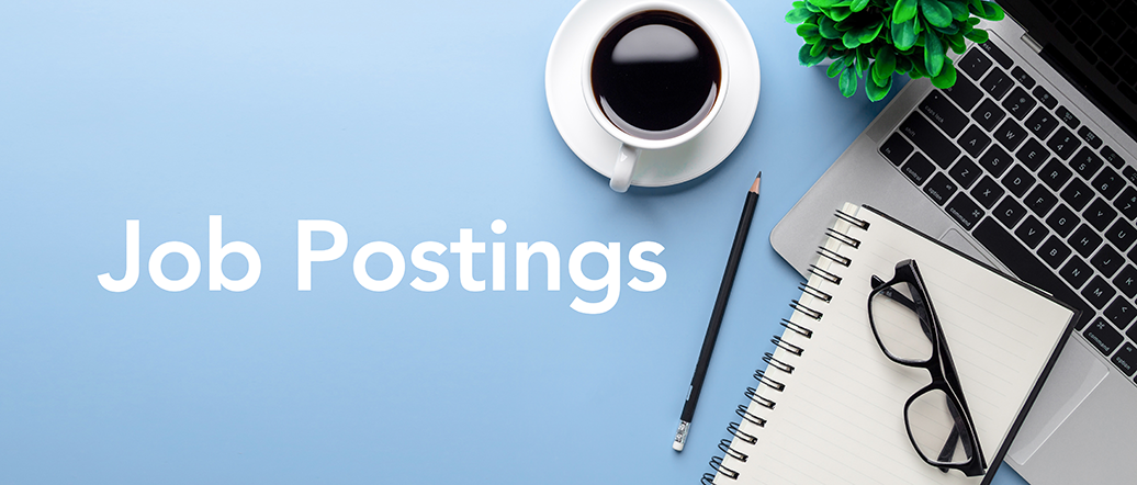 Job Postings – desk with laptop, glasses, notepad, pen and cup of coffee Job Postings – desk with laptop, glasses, notepad, pen and cup of coffee