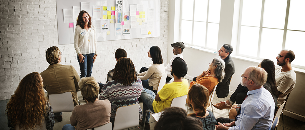 Group of educators having a discussion at a workshop