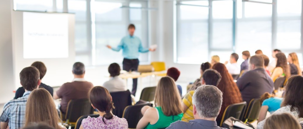 Conference speaker with audience